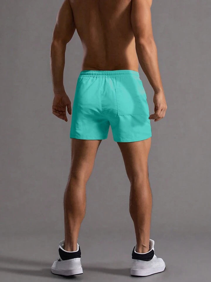 Homme Loose Men Solid Drawstring Waist Shorts